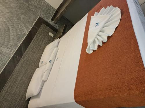 Posteľ alebo postele v izbe v ubytovaní Hotel Albatros