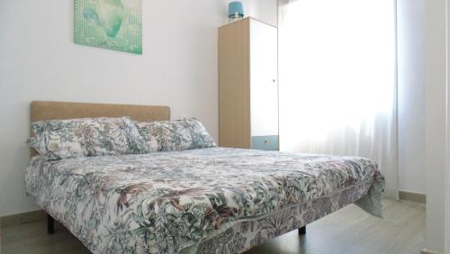 Posteľ alebo postele v izbe v ubytovaní APARTAMENTO EN CENTRO A 150M DEL MAR Apolo B