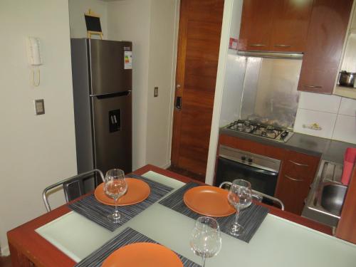 Dapur atau dapur kecil di Cómodo y elegante departamento
