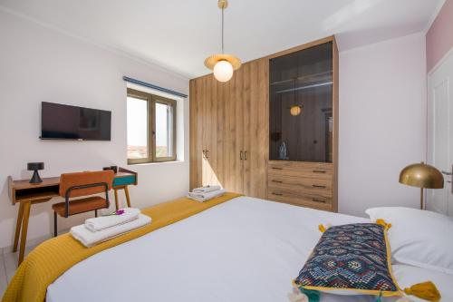 Posteľ alebo postele v izbe v ubytovaní Anastasia & Maria Luxury Residence