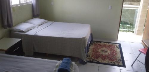 Cama o camas de una habitación en Flat Santa Maria