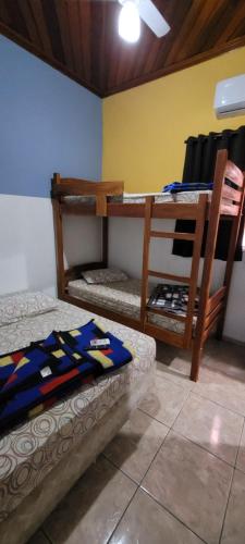 Cama o camas de una habitación en Pousada e Restaurante Estrela Azul