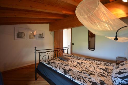 Postel nebo postele na pokoji v ubytování Casa Fornico