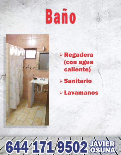 a bathroom with a sink and a shower curtain at Casa Amplia, pleno centro de la Ciudad. in Ciudad Obregón
