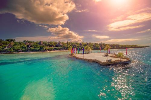 an island in the middle of a body of water at Mithi Resort & Spa in Panglao