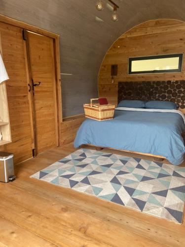 Letto o letti in una camera di Glamping La Cepa GUATAPÉ