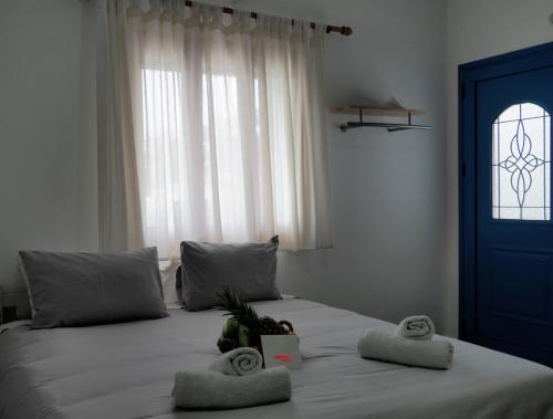 Ένα ή περισσότερα κρεβάτια σε δωμάτιο στο Panorama Studios & Apartments