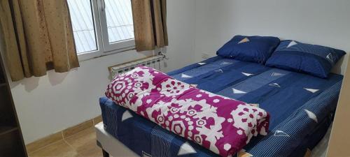 Katil atau katil-katil dalam bilik di La casa de lolo