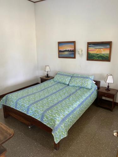 Postel nebo postele na pokoji v ubytování Hotel Del Aserradero