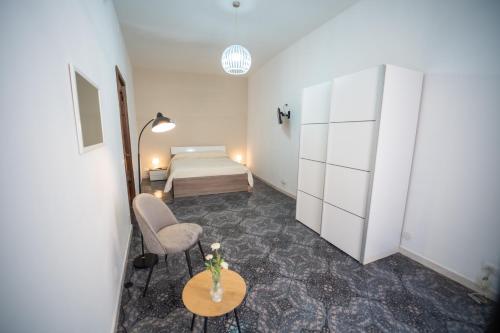 A bed or beds in a room at Al Corso 213