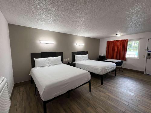 Ένα ή περισσότερα κρεβάτια σε δωμάτιο στο Motel 6-Orange, CA - Anaheim