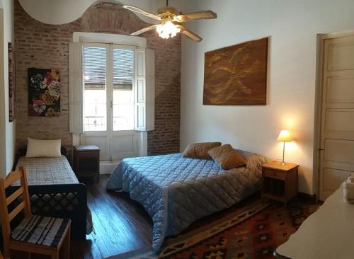 Ένα ή περισσότερα κρεβάτια σε δωμάτιο στο Casa Rodo 53