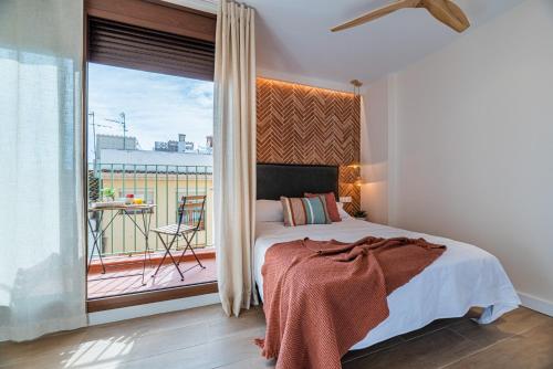Postel nebo postele na pokoji v ubytování Vestal Suites Domo