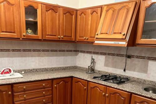 Kuchyň nebo kuchyňský kout v ubytování Duplex appartement Beni Bouayach