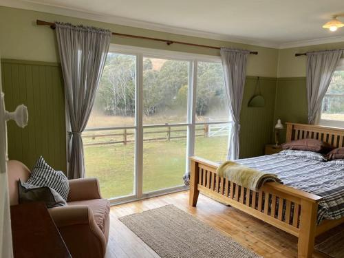 Ένα ή περισσότερα κρεβάτια σε δωμάτιο στο Unique Country Retreat Taralga-Bannaby