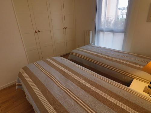 Posteľ alebo postele v izbe v ubytovaní Magnifique T2 40m² avec terrasse, accès direct plage et piscine à Sète - FR-1-472A-268