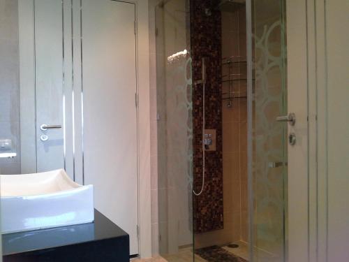 Bilik mandi di Cosy Beach View Apartments