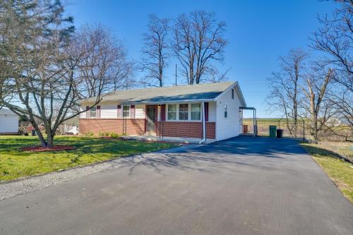 a house with a driveway in front of it at Deck and Grill Convenient Home in Hummelstown in Hummelstown