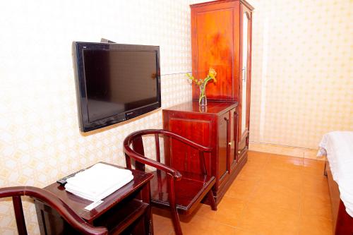 TV a/nebo společenská místnost v ubytování Hà Giang Hotel Sapa