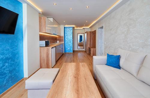 Kuchyň nebo kuchyňský kout v ubytování Family Hotel Regata