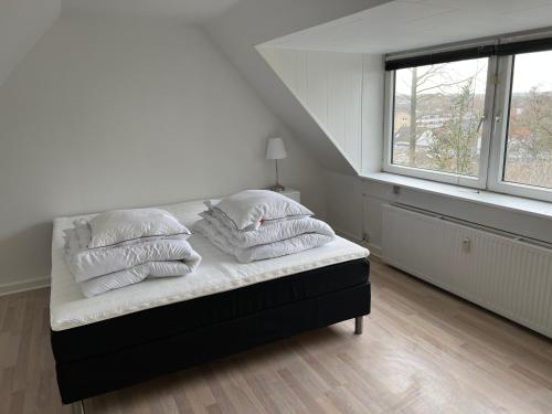 Кровать или кровати в номере Great View Apartments 2