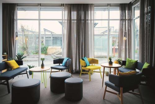 Гостиная зона в Vienna House Easy by Wyndham Bad Oeynhausen