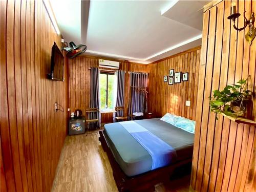 Ένα ή περισσότερα κρεβάτια σε δωμάτιο στο Tam Coc Mandala Villa & Homestay