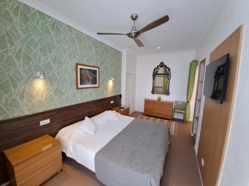 Ένα ή περισσότερα κρεβάτια σε δωμάτιο στο Residence Veles Plage