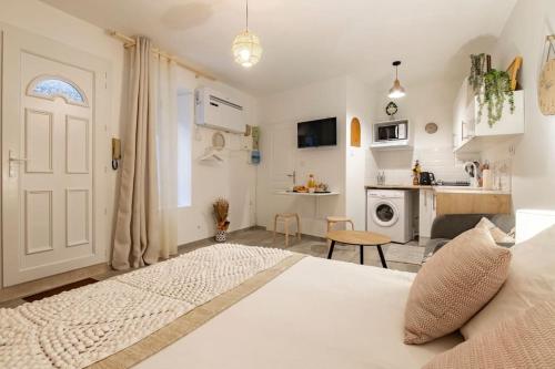 Posteľ alebo postele v izbe v ubytovaní Studio « le Bohème chic »