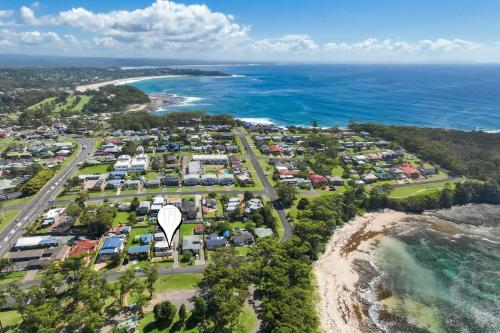 an aerial view of a parking lot next to the ocean at Crescent Harbour in Ulladulla