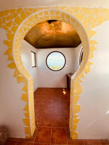 an archway in a room with a window at Casa de Arte in Boracay