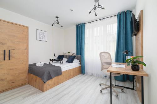 Posteľ alebo postele v izbe v ubytovaní Modern Studio Cracow Rakowicka 14 by Noclegi Renters