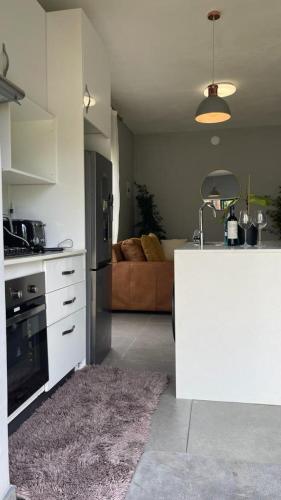 Kuchyň nebo kuchyňský kout v ubytování Stunning luxurious studio in Malindela - 2044