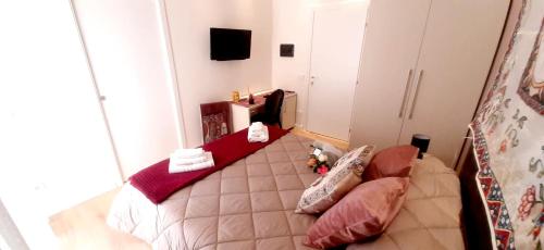 Ένα ή περισσότερα κρεβάτια σε δωμάτιο στο Massimo Luxury Rooms
