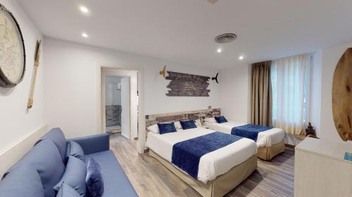 Posteľ alebo postele v izbe v ubytovaní Hotel Bella Dolores