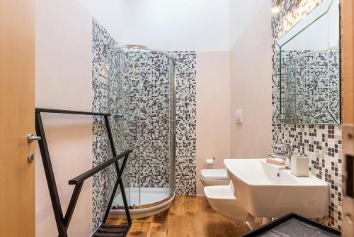 Koupelna v ubytování Casa Lidia Luxury attico 7