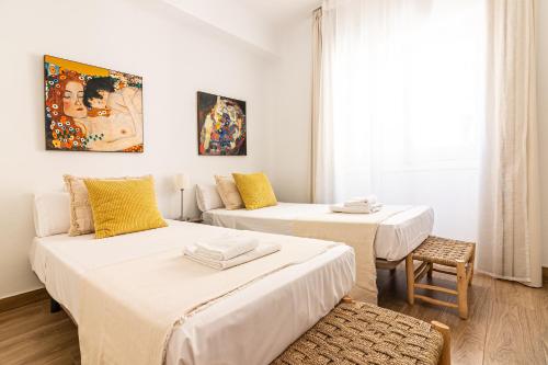 Posteľ alebo postele v izbe v ubytovaní Malaga Center Flat Holidays City Center