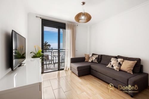 Cozy apartment with sea view and private parking in Fuengirola
