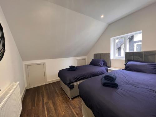 Tempat tidur dalam kamar di Star London Finchley Road 3-Bed Abode