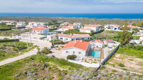 an aerial view of a village with houses at Villa Sound of the Sea by Portugal Collection in Aljezur