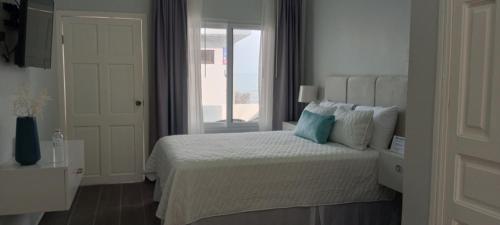 Tramonto Boutique Hotelにあるベッド