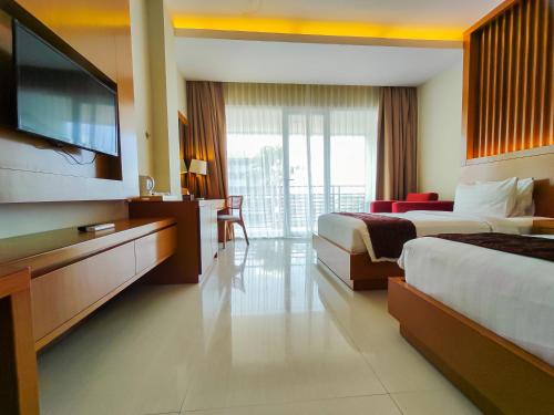 Seminyak Square Hotel And Villasにあるベッド