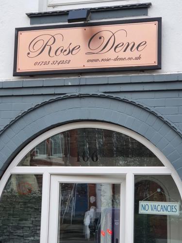 a sign over the door of a store at Rose-Dene in Scarborough