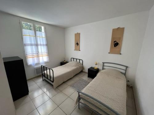 Postel nebo postele na pokoji v ubytování Maison la Soleiade