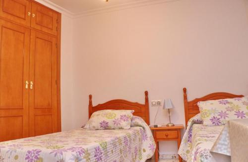 Posteľ alebo postele v izbe v ubytovaní Habitación Calle Ancha 04