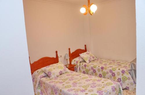 Postel nebo postele na pokoji v ubytování Habitación Calle Ancha 04