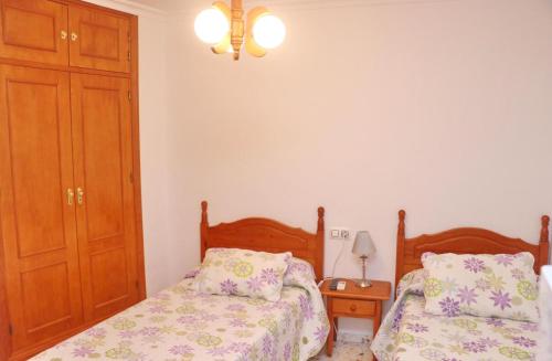 Postel nebo postele na pokoji v ubytování Habitación Calle Ancha 04