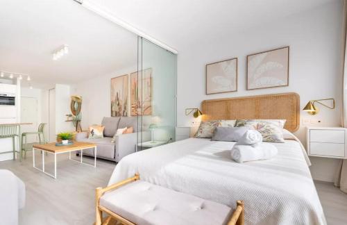 Cama o camas de una habitación en El Bajondillo Premium loft