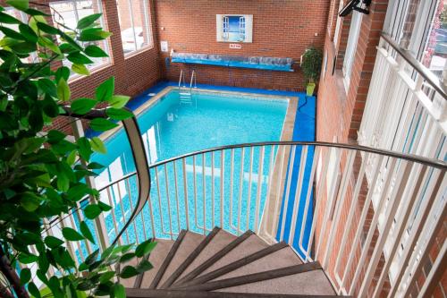 a view of a swimming pool from a balcony at Palm Court Hotel in Great Yarmouth