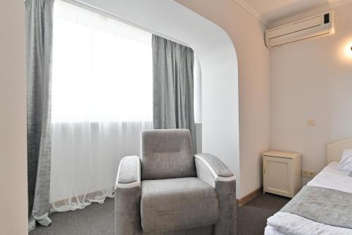 Makis Hotel SPAにあるベッド